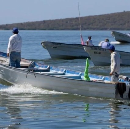 Pescadores del embarcadero de la puntilla